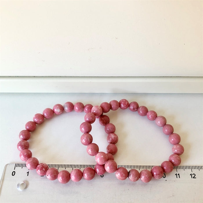 Thulit Armbånd Perler 8 mm 17-18 cm.