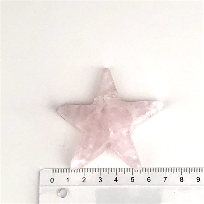 Rosenkvarts Stjerne 7 cm. Den har ujævnheder.